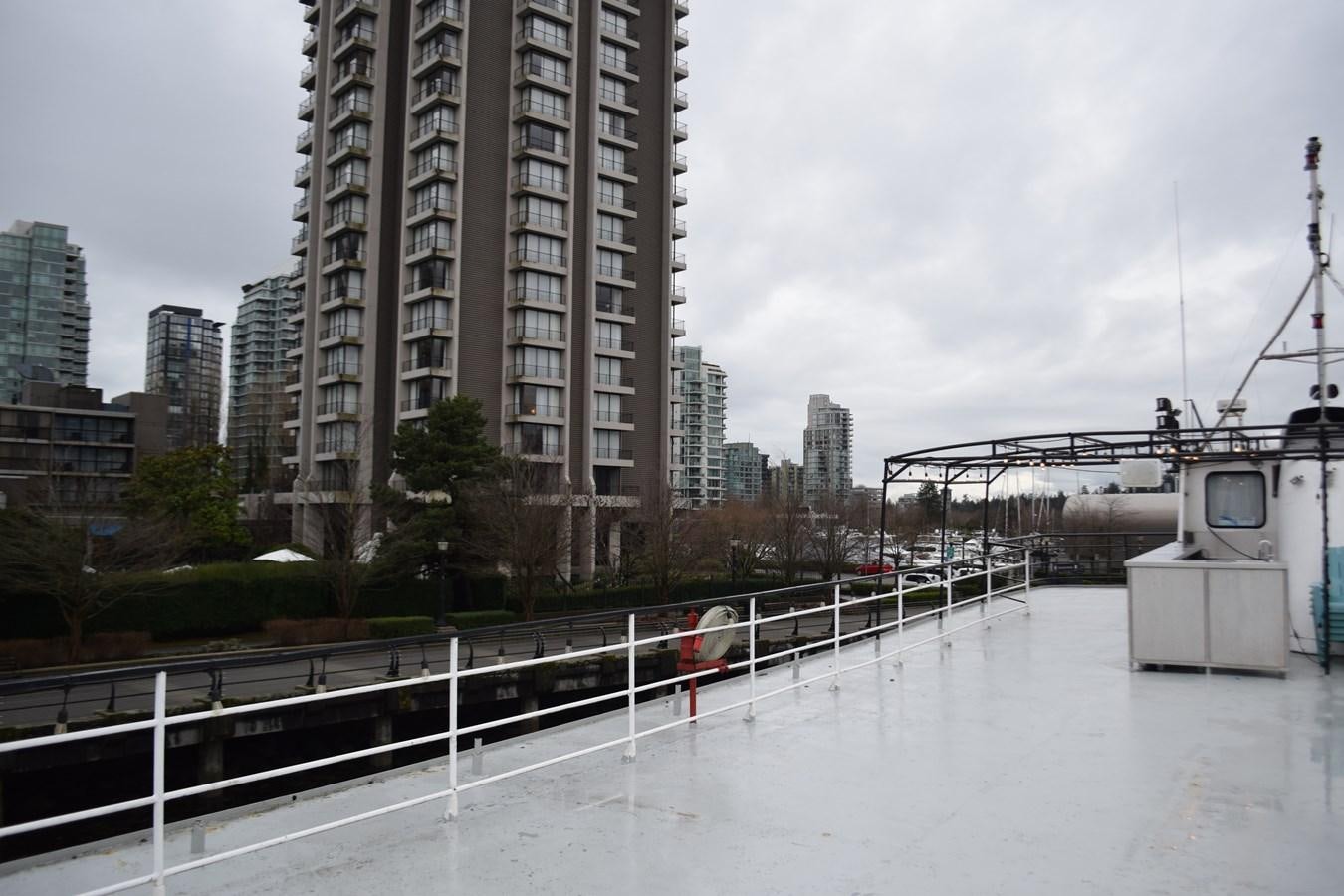 a bridge over water with buildings in the background aboard MAGIC SPIRIT Yacht for Sale