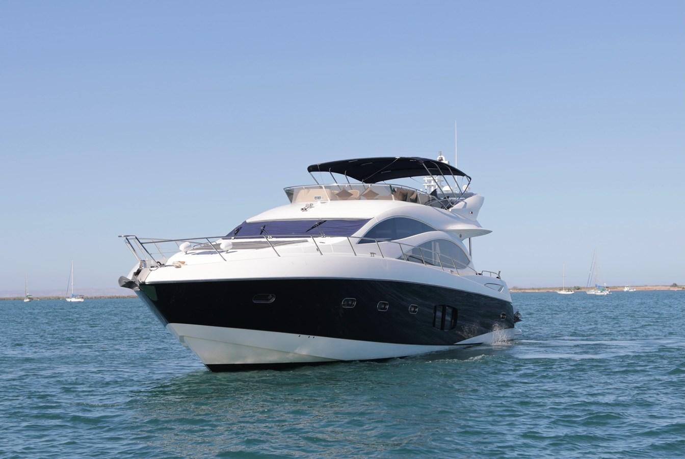 a white yacht in the water aboard CAPRICHO II Yacht for Sale