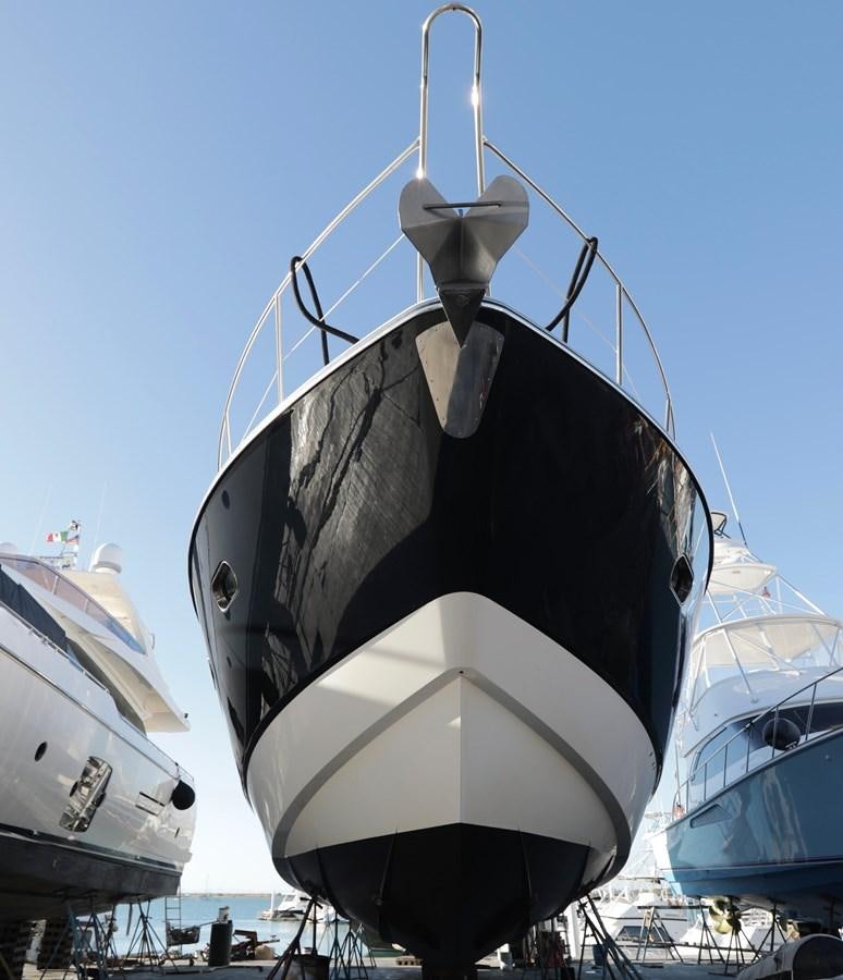 a large boat with a propeller aboard CAPRICHO II Yacht for Sale