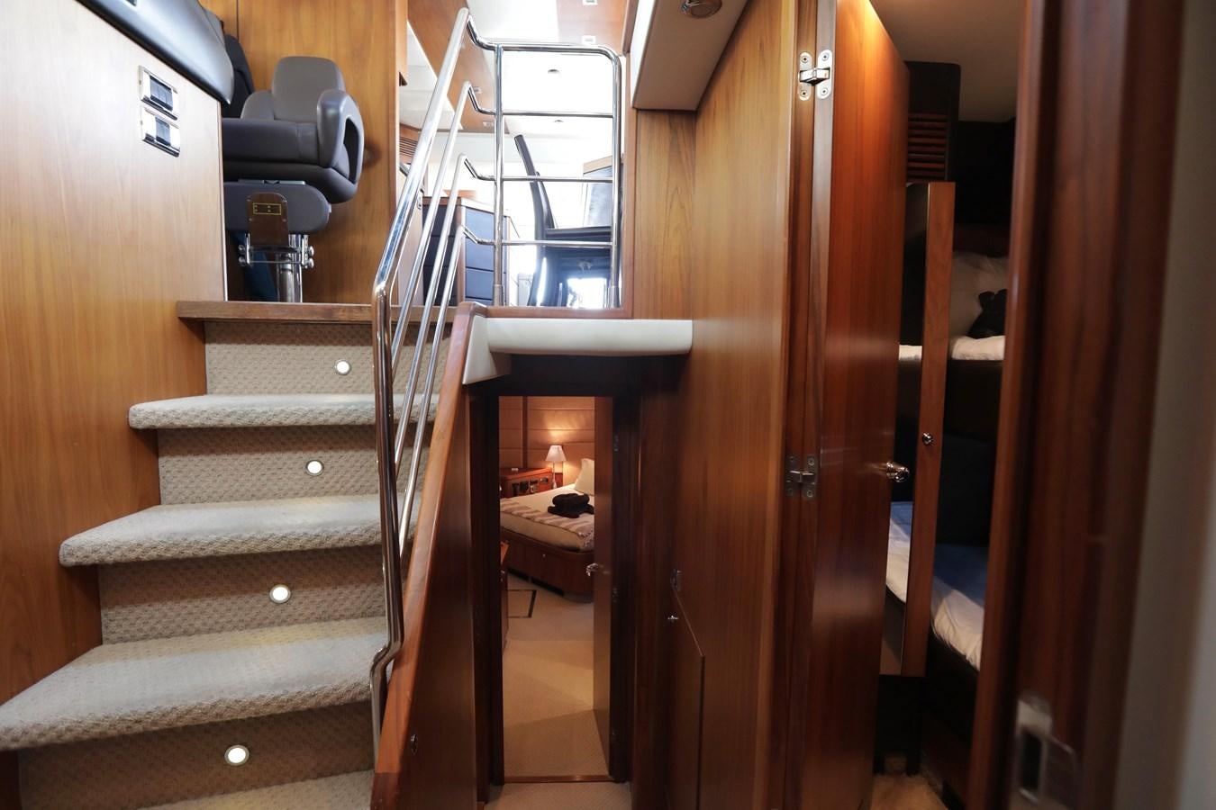 a set of stairs leading to a room aboard CAPRICHO II Yacht for Sale