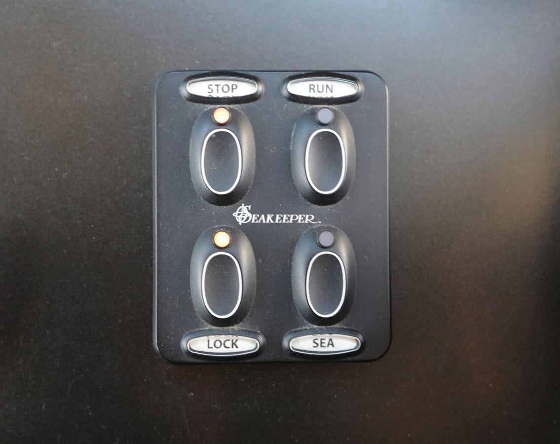 a black video game controller aboard CAPRICHO II Yacht for Sale