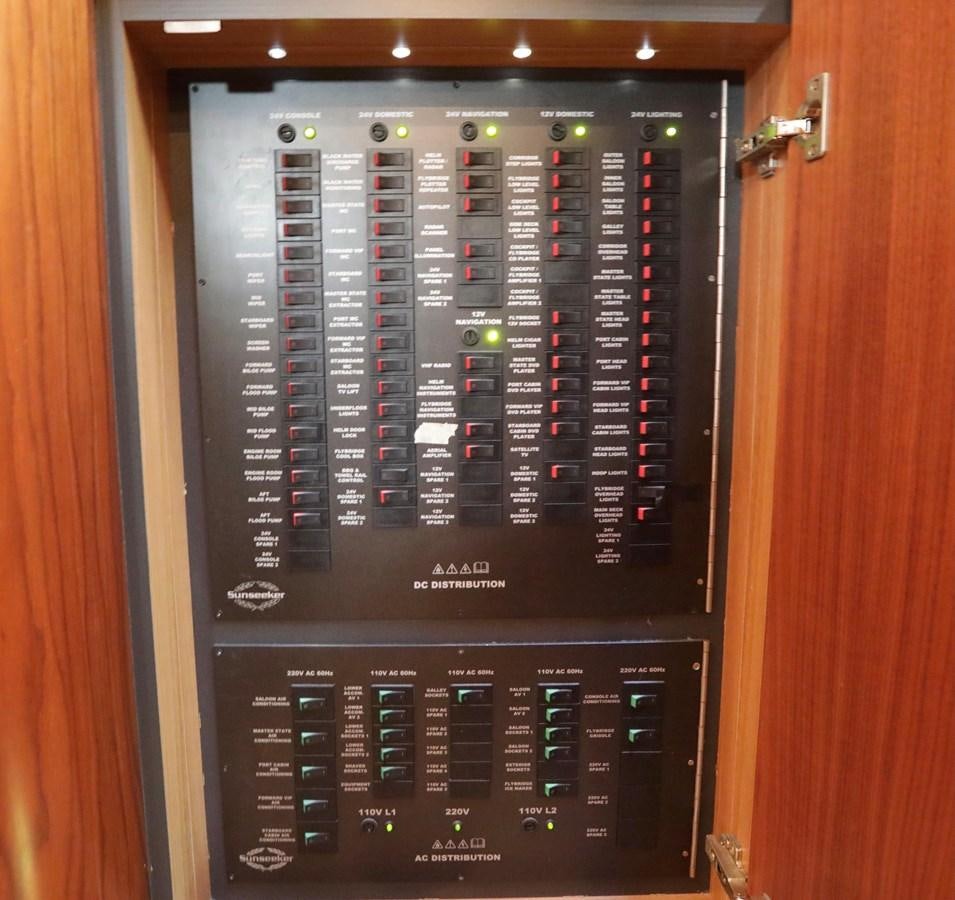 a computer tower with a black screen aboard CAPRICHO II Yacht for Sale