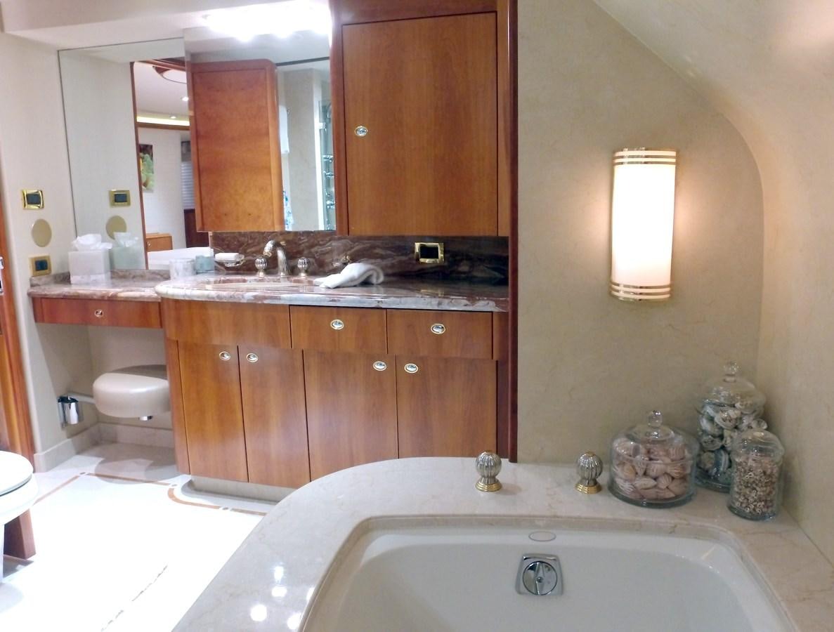 a bathroom with a sink and a toilet aboard SHORT GAME Yacht for Sale