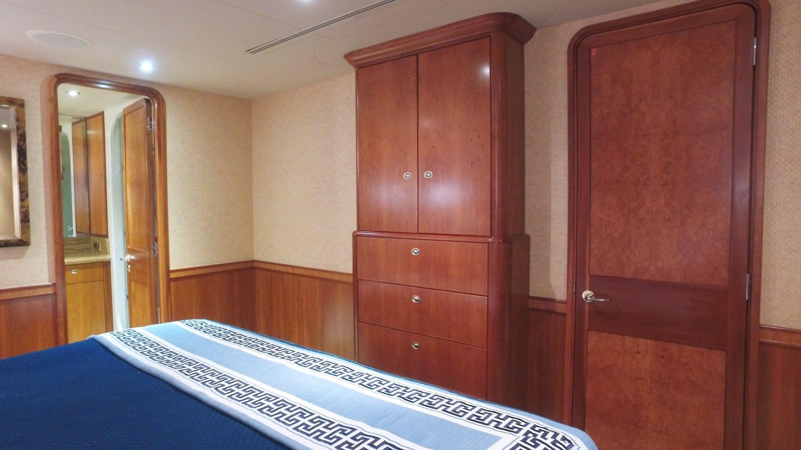 a room with a pool table and a closet aboard SHORT GAME Yacht for Sale