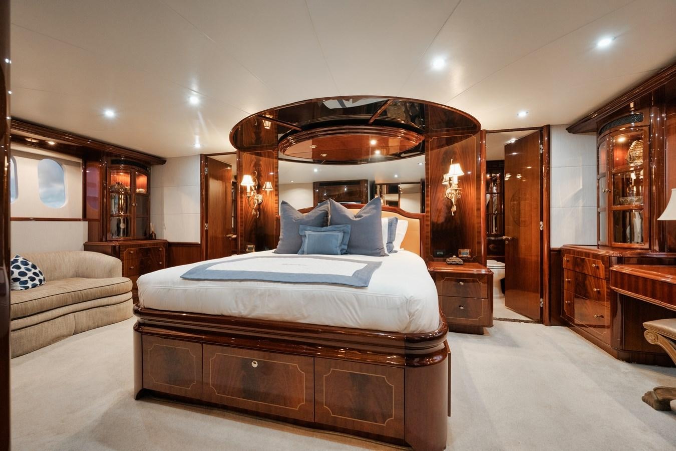 a large bed in a room aboard BELLA CONTESSA Yacht for Sale