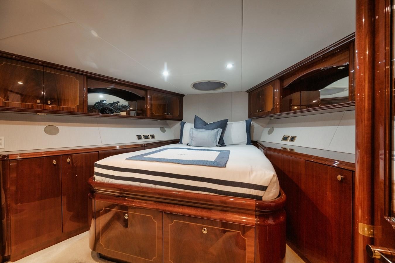 a bedroom with a bed aboard BELLA CONTESSA Yacht for Sale