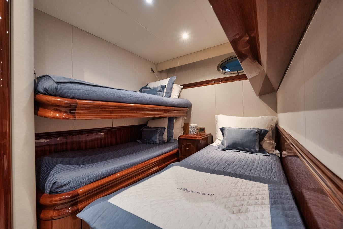 a couple of beds in a room aboard BELLA CONTESSA Yacht for Sale