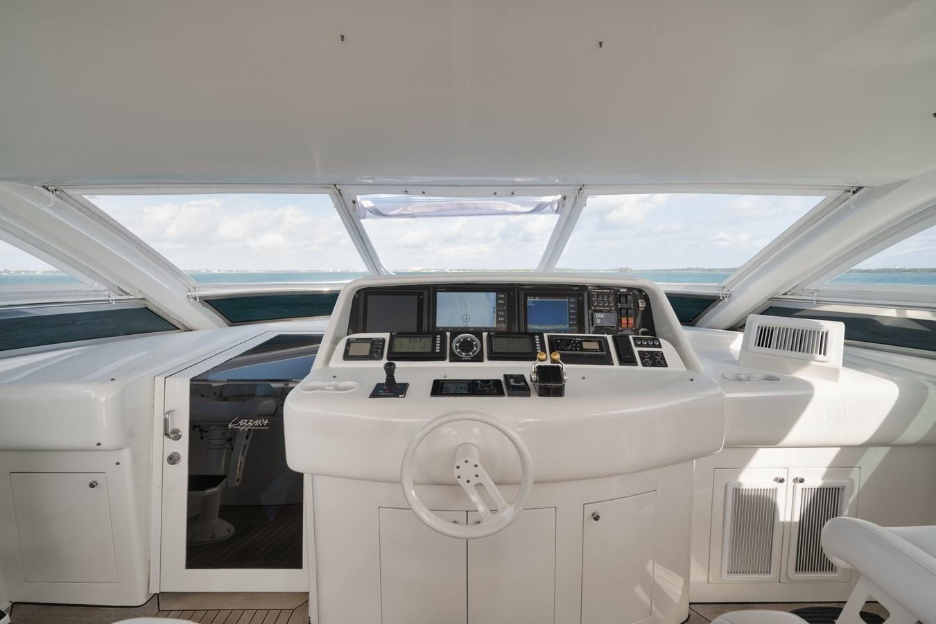 the inside of a car aboard BELLA CONTESSA Yacht for Sale
