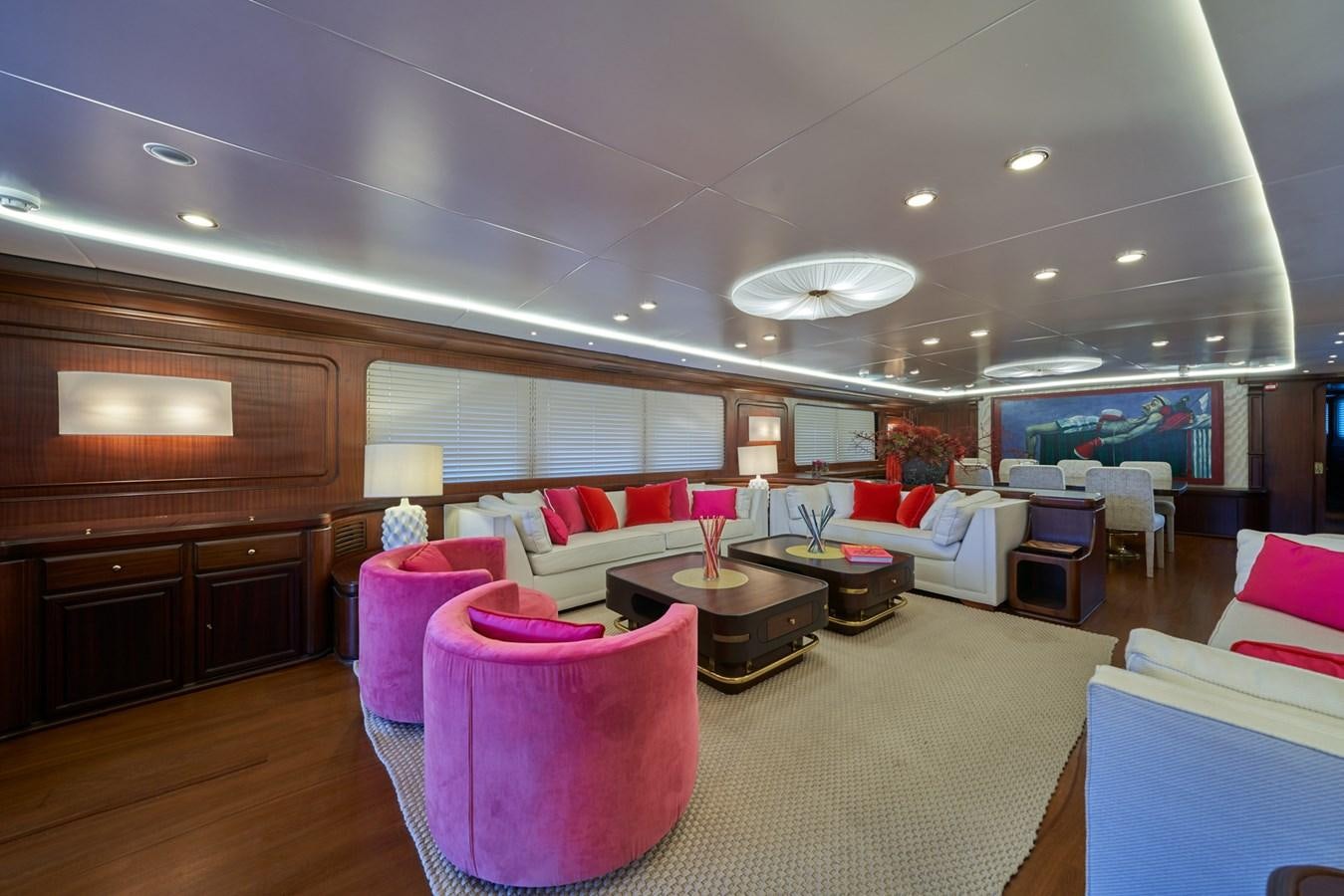 a room with a couch and a table and chairs aboard EL CARAN Yacht for Sale