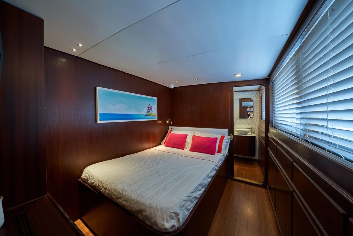 a bed in a room aboard EL CARAN Yacht for Sale