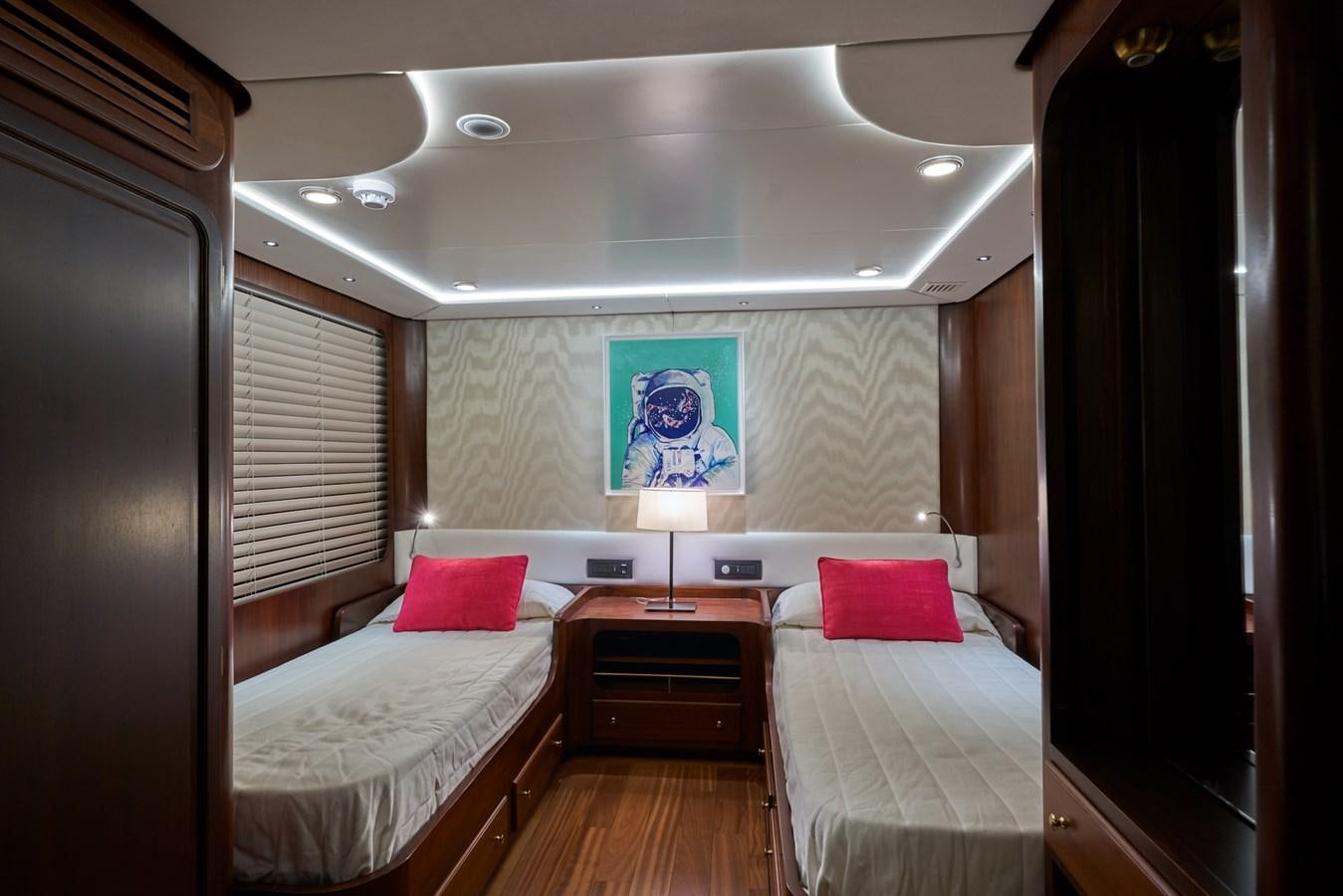 a room with two beds aboard EL CARAN Yacht for Sale