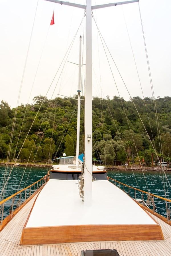 a sailboat on a dock aboard ROYAL MARIS Yacht for Sale