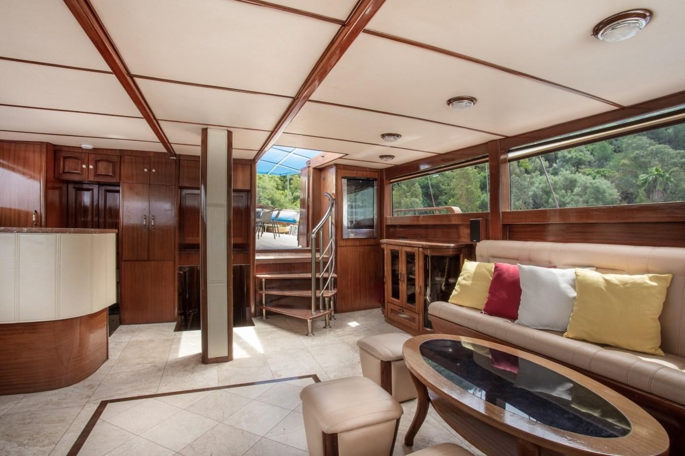 a living room with a large window aboard ROYAL MARIS Yacht for Sale