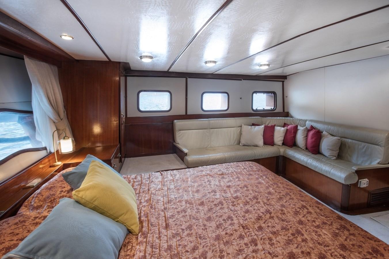 a large bed in a room aboard ROYAL MARIS Yacht for Sale