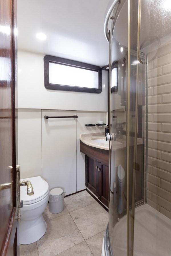 a bathroom with a glass shower aboard ROYAL MARIS Yacht for Sale