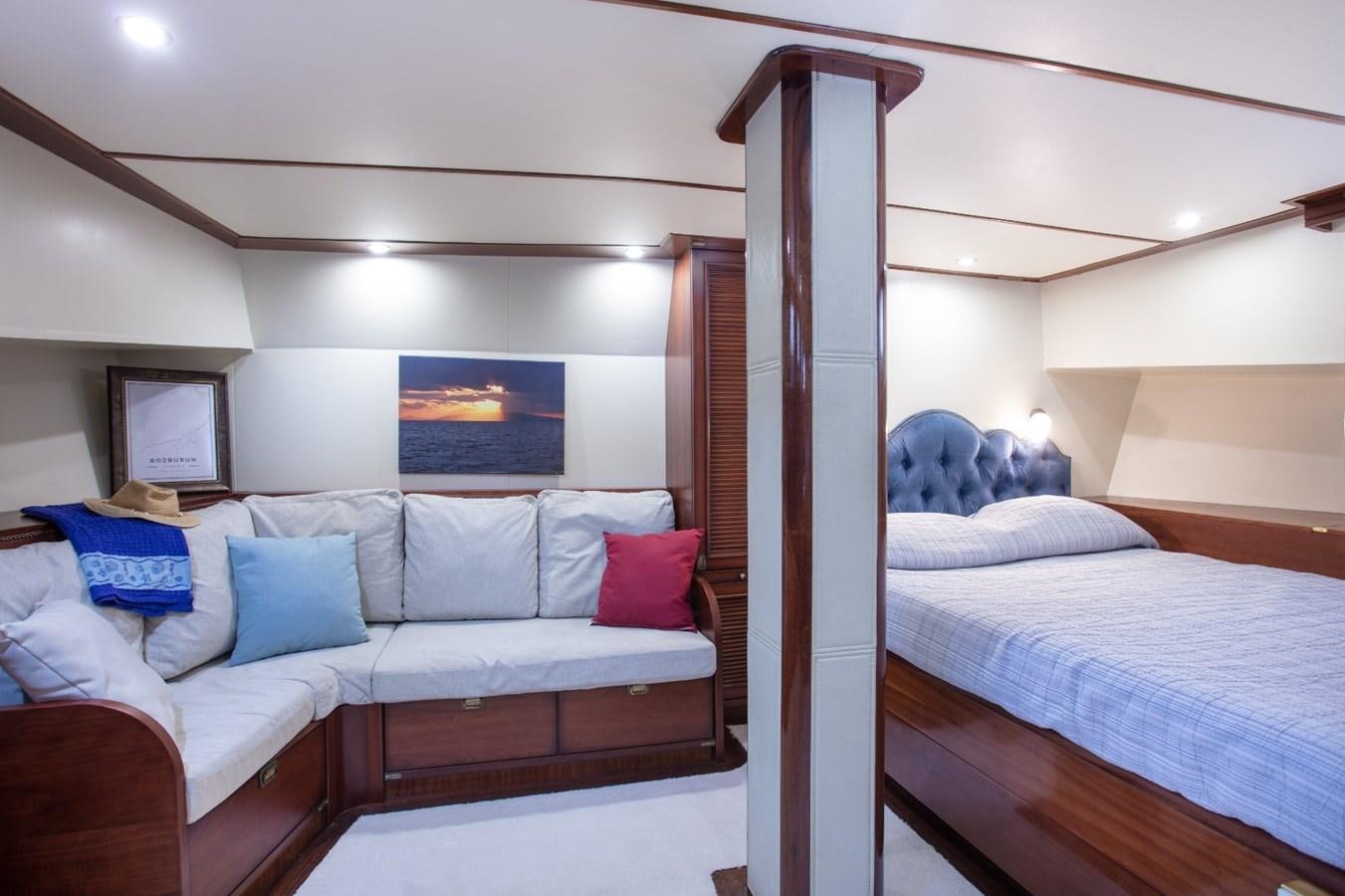 a room with a bed and a wood frame aboard ROYAL MARIS Yacht for Sale
