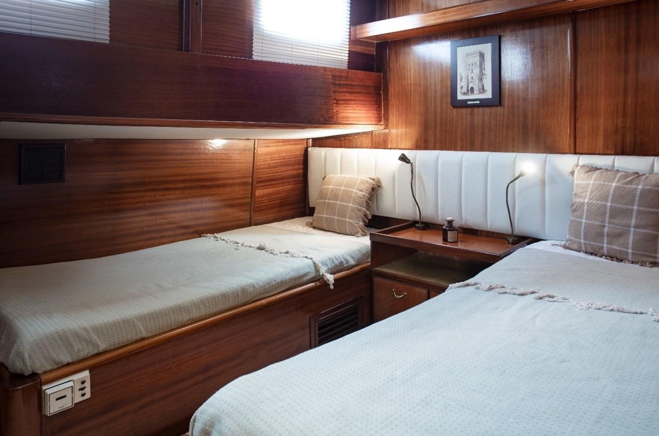 a couple of beds in a room aboard ROYAL MARIS Yacht for Sale
