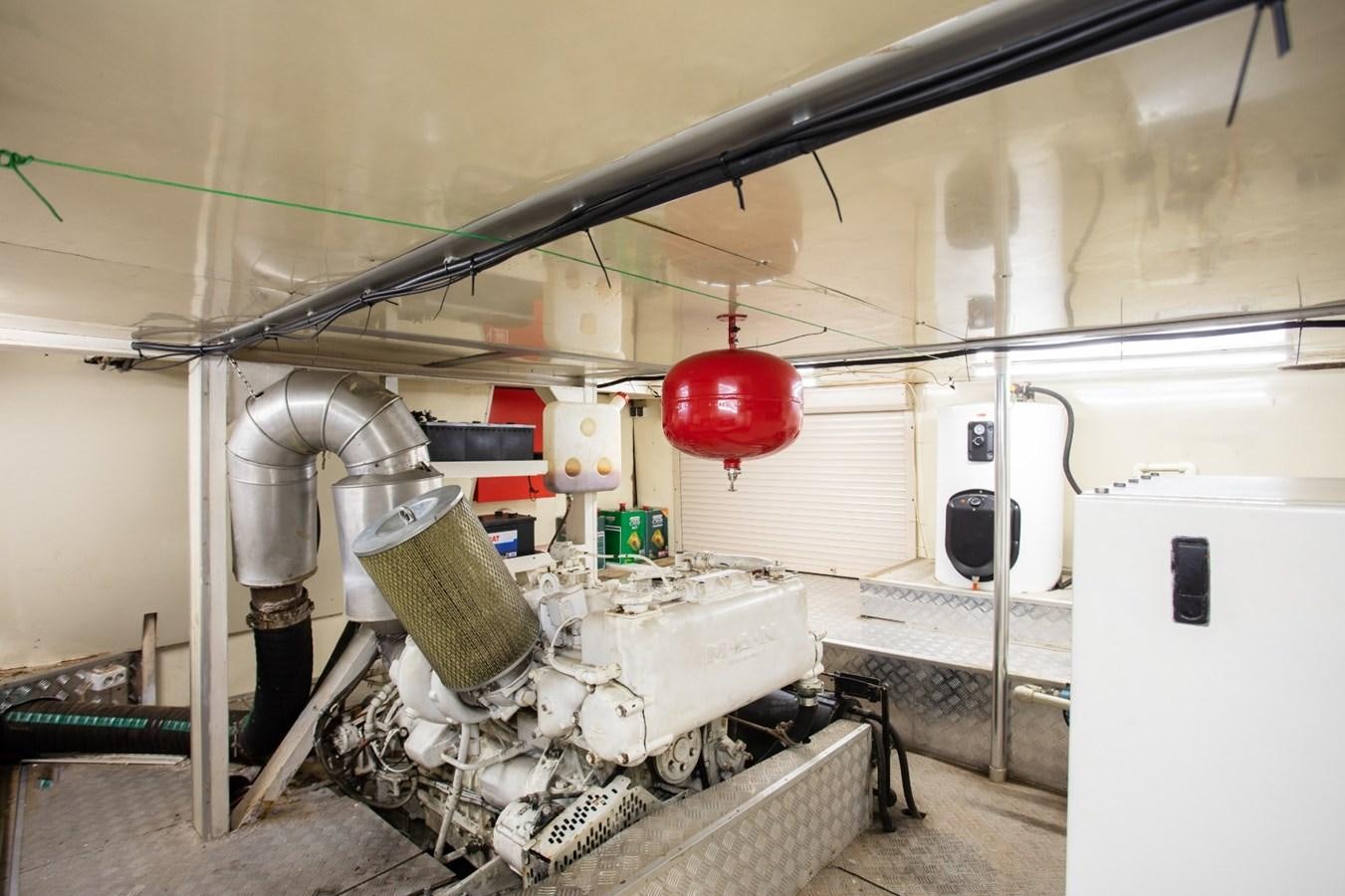 a large machine in a room aboard ROYAL MARIS Yacht for Sale