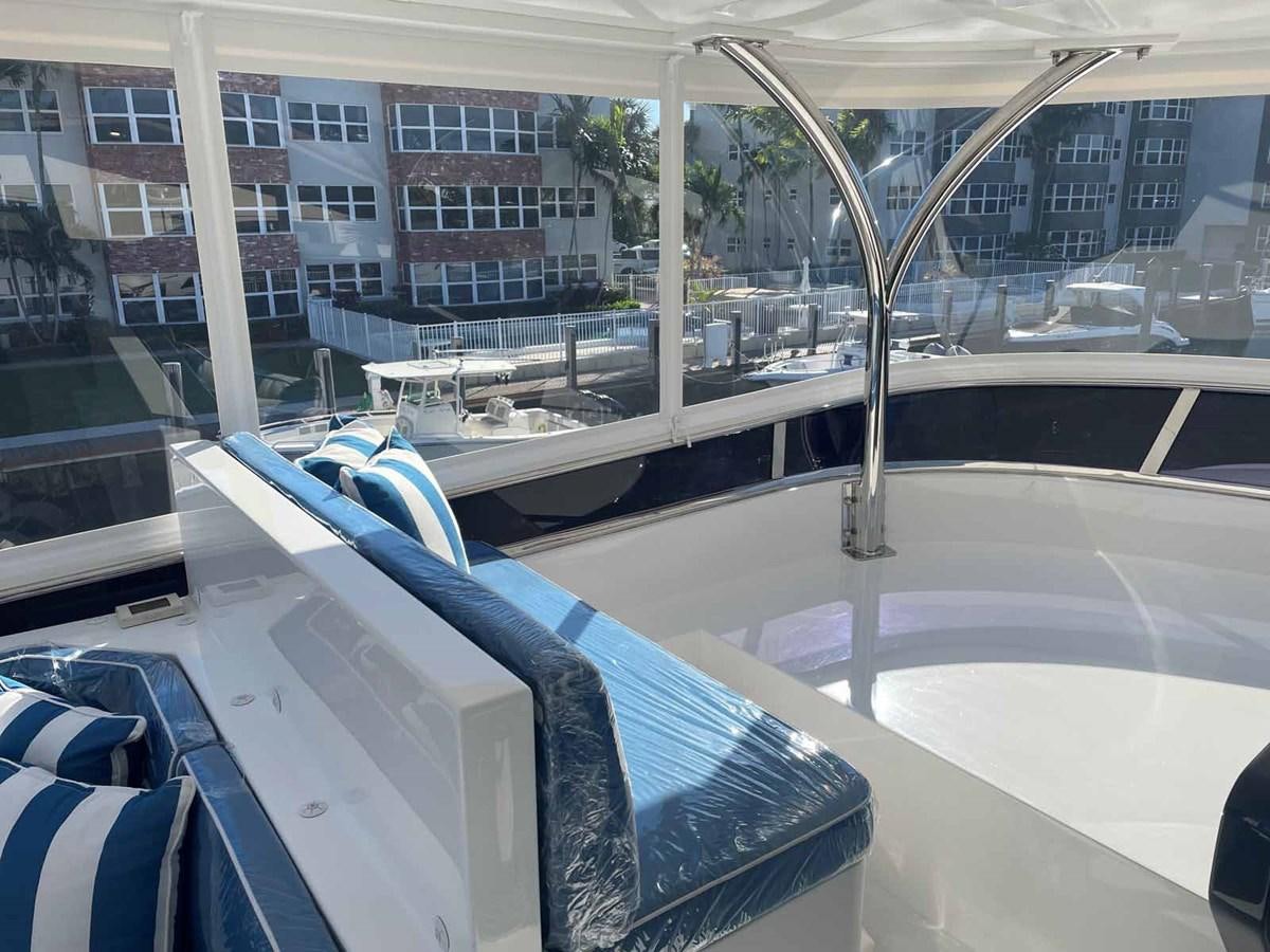 inside of a building aboard JOHNSON 80' SKYLOUNGE W/HYDRAULIC PLATFORM Yacht for Sale