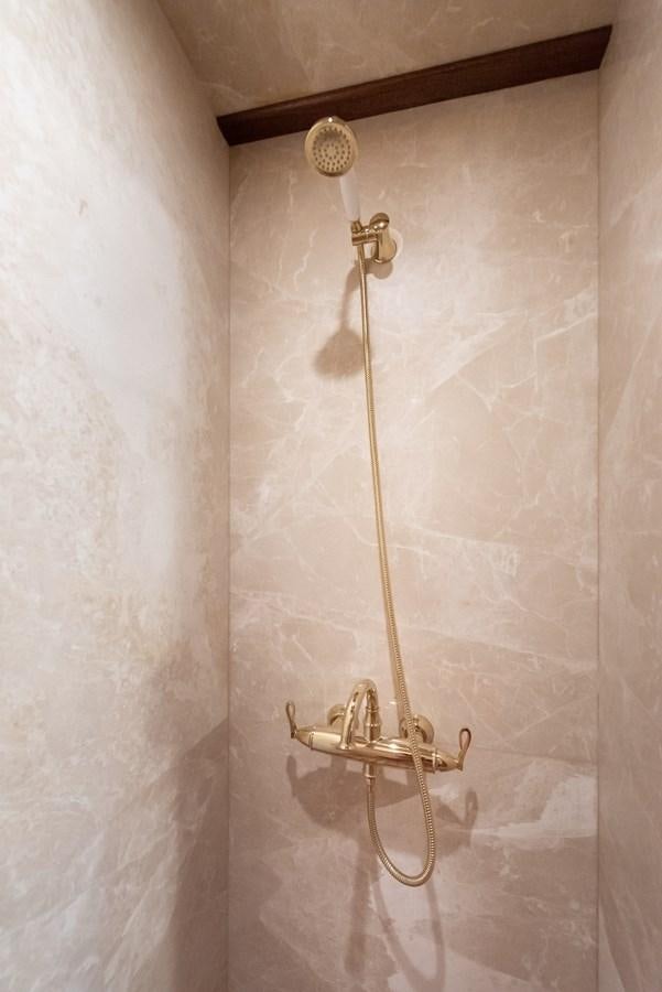 a shower with a handle aboard CAPTAIN COOK Yacht for Sale