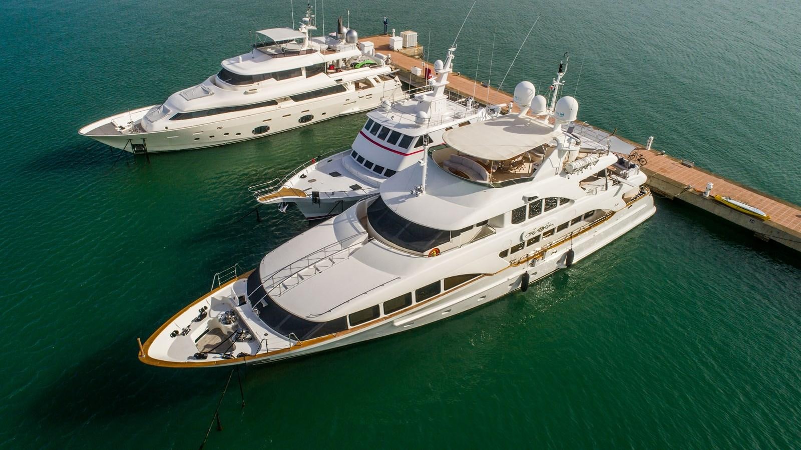 a group of boats on a body of water aboard ORINOKIA Yacht for Sale