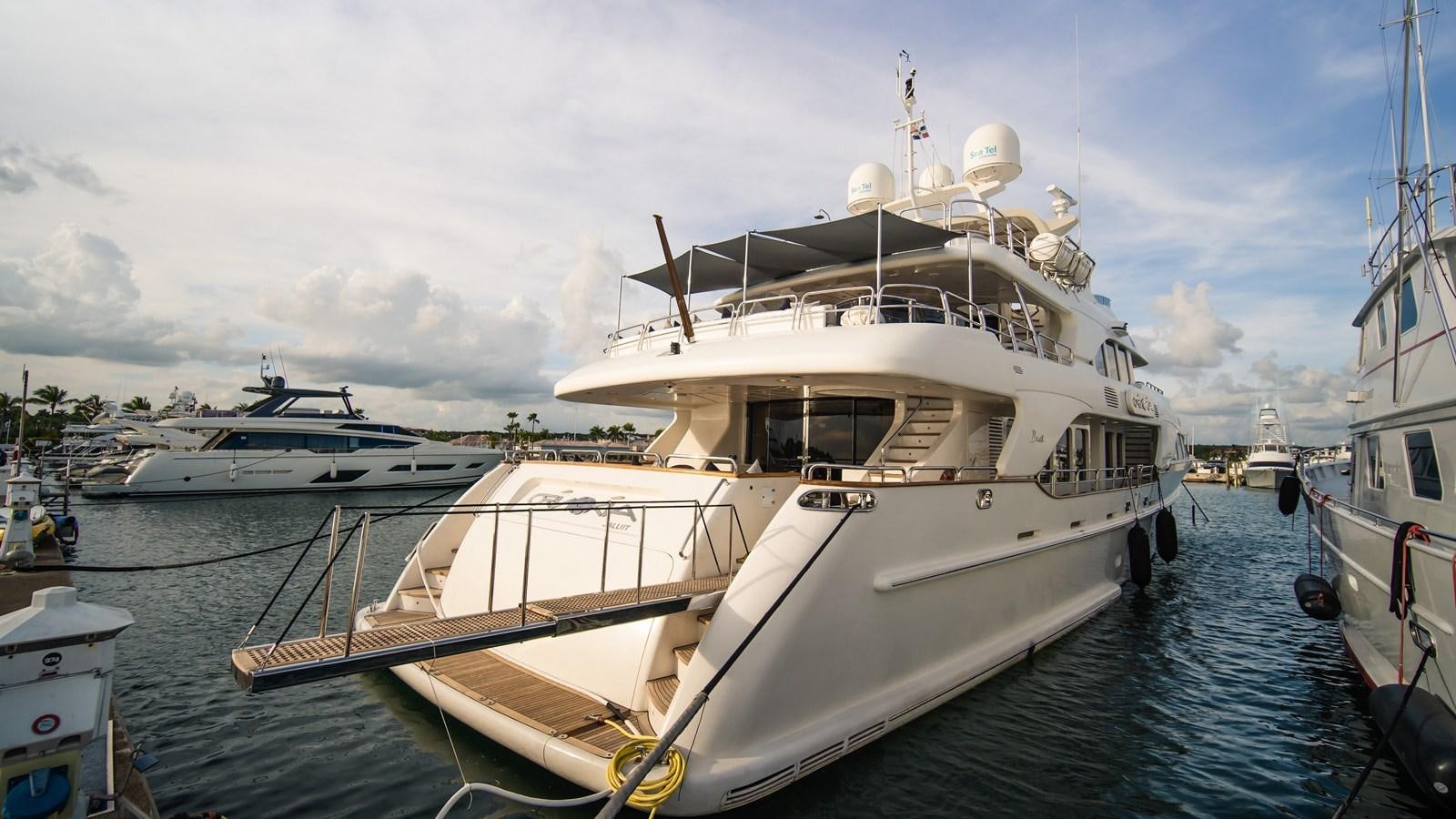 a boat docked at a pier aboard ORINOKIA Yacht for Sale