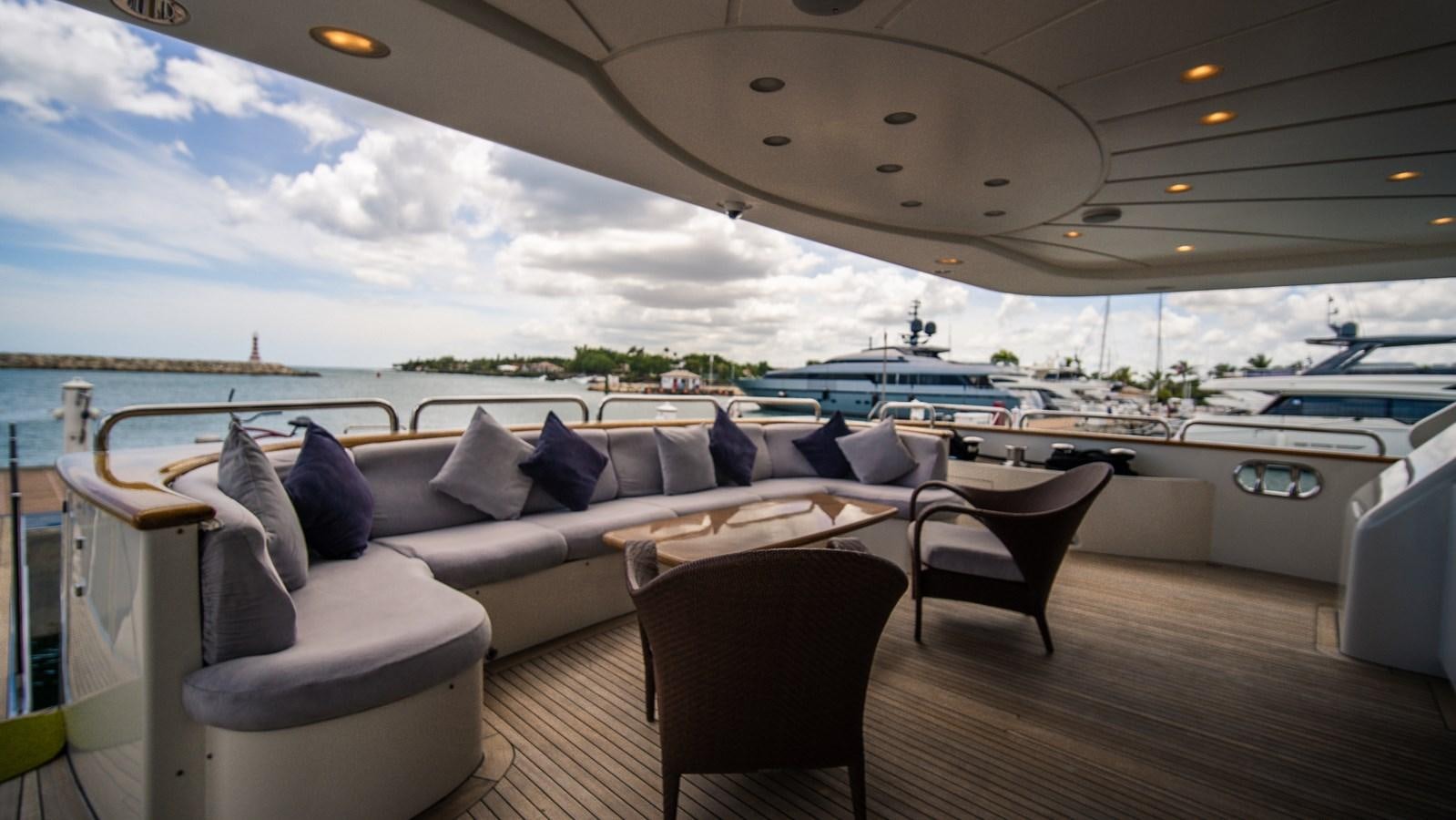 a large living room with a large window overlooking the ocean aboard ORINOKIA Yacht for Sale