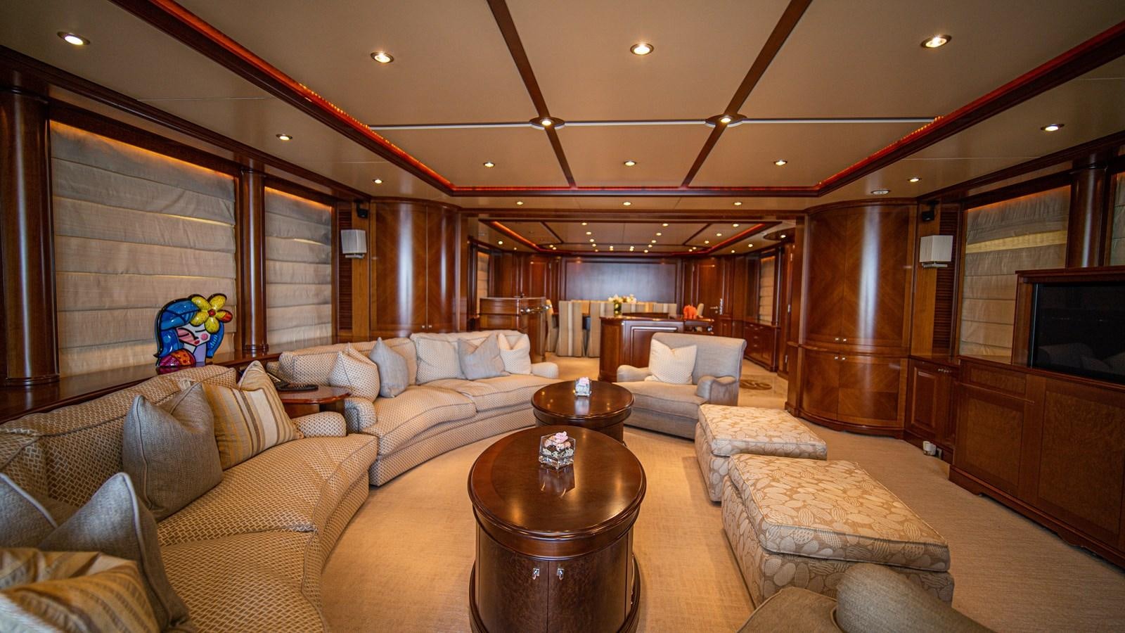 a living room with a large window aboard ORINOKIA Yacht for Sale