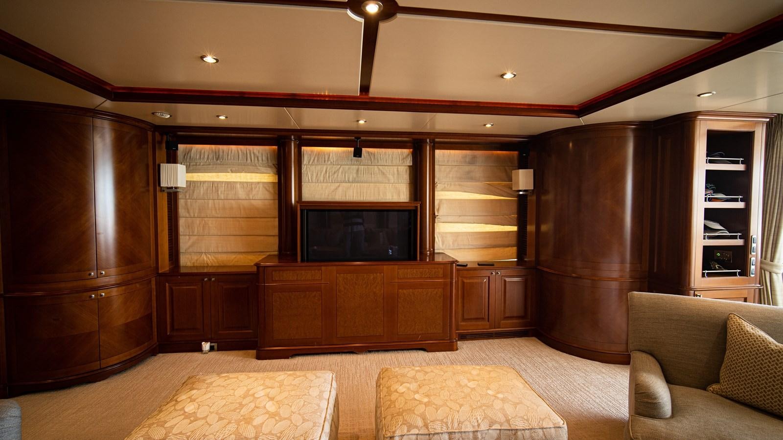a living room with a large tv aboard ORINOKIA Yacht for Sale