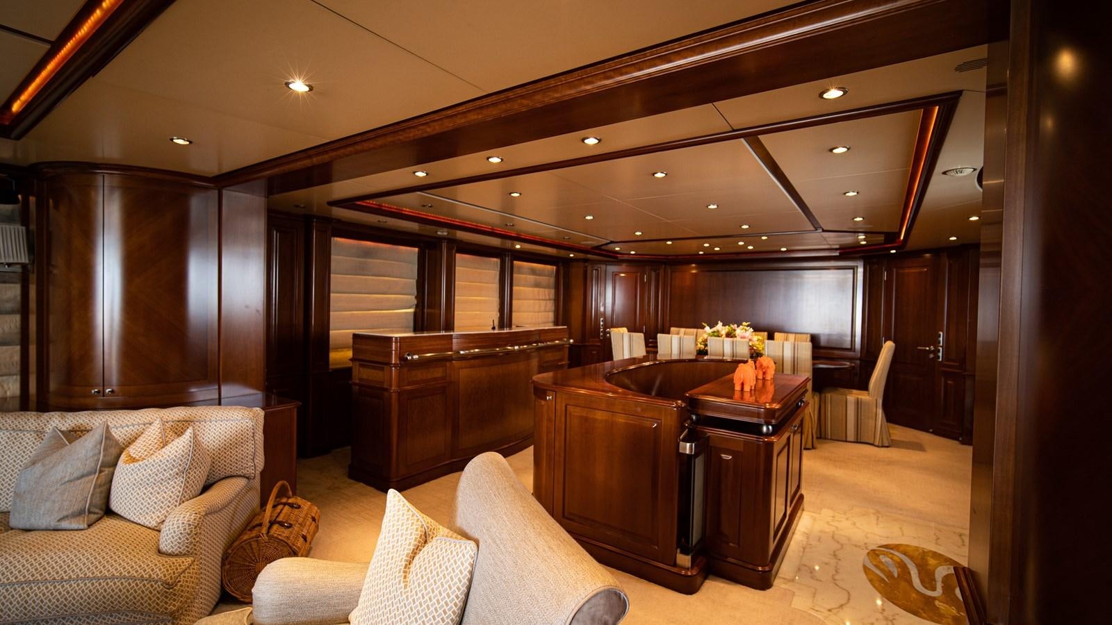 a large living room with a piano aboard ORINOKIA Yacht for Sale