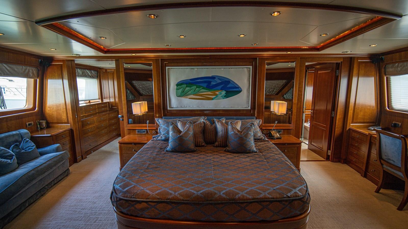 a large bed in a room aboard ORINOKIA Yacht for Sale