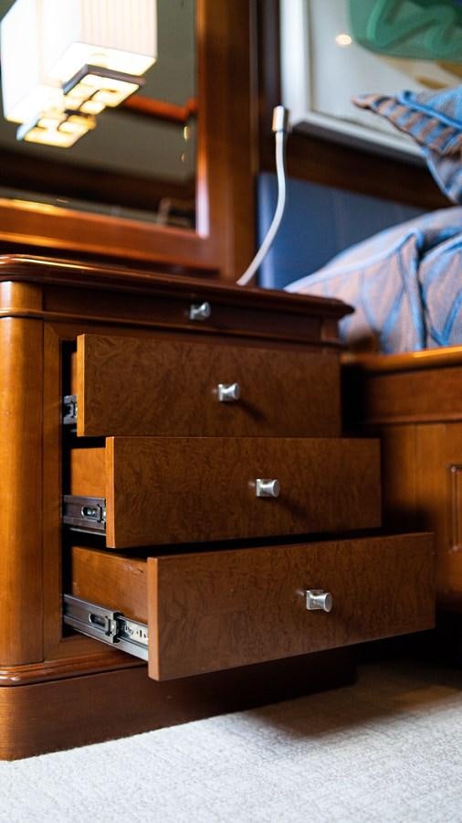a dresser with a mirror above it aboard ORINOKIA Yacht for Sale