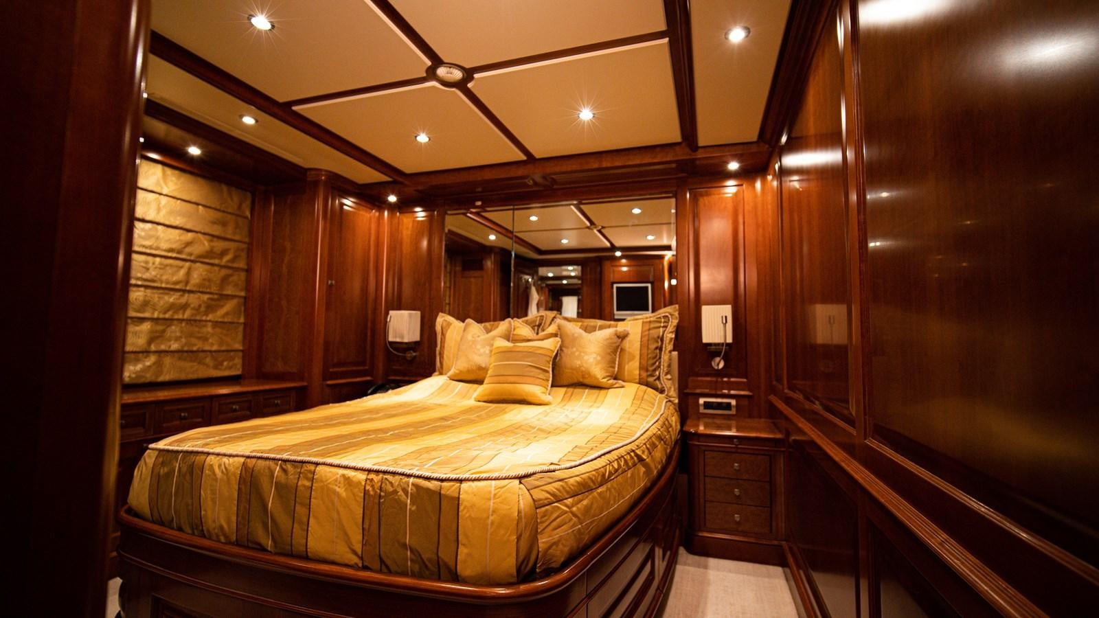 a bed in a room aboard ORINOKIA Yacht for Sale