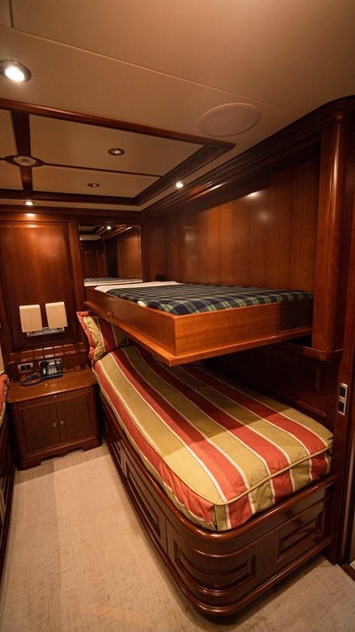 a bed in a room aboard ORINOKIA Yacht for Sale