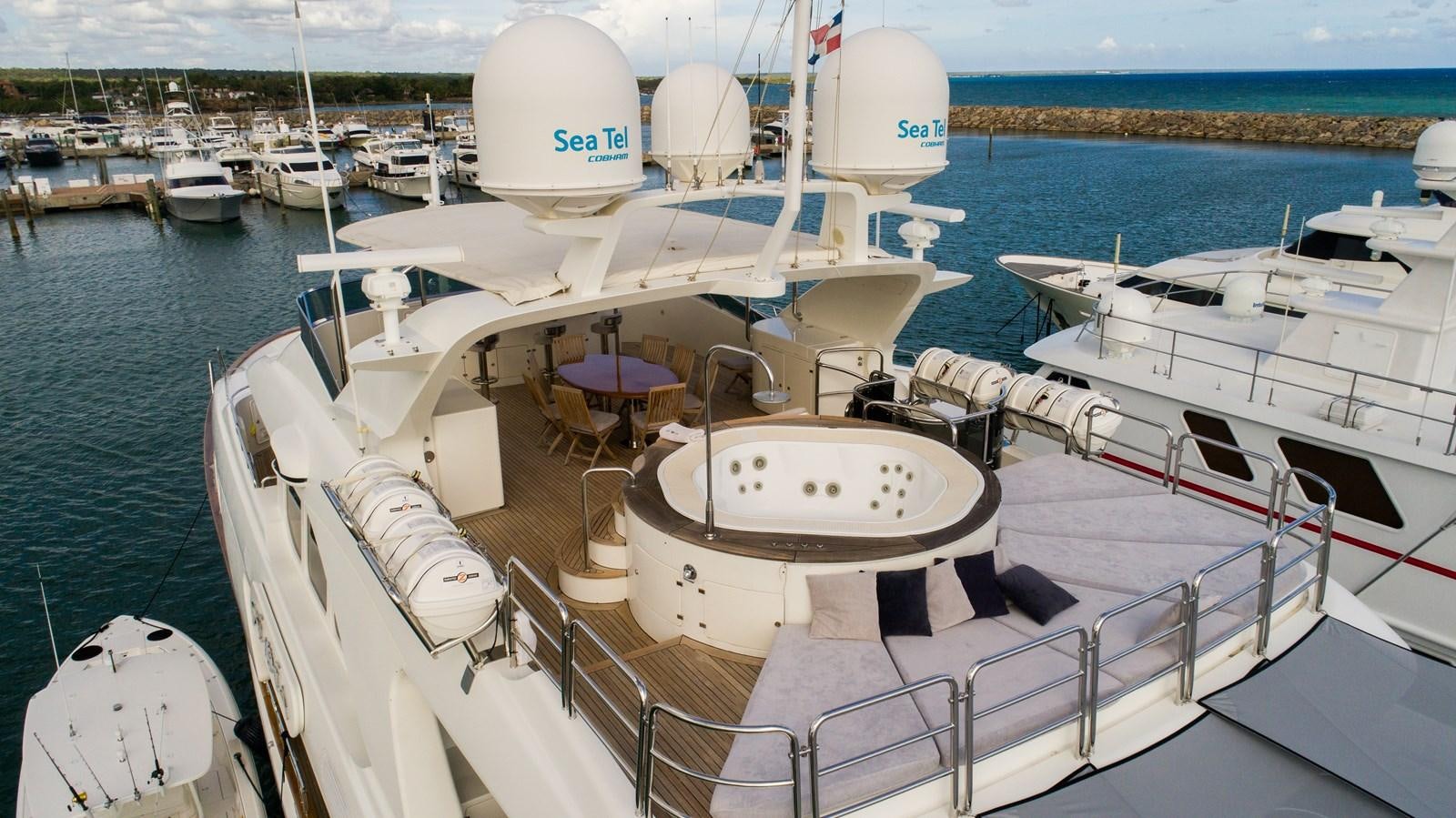 a boat docked at a pier aboard ORINOKIA Yacht for Sale