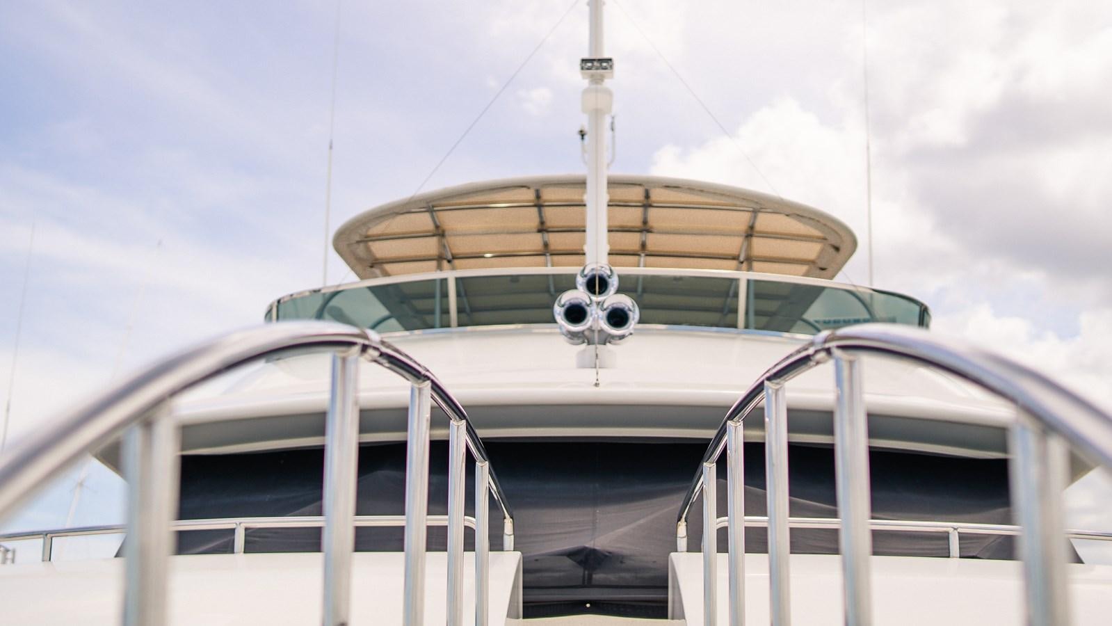 a white boat with a round roof aboard ORINOKIA Yacht for Sale