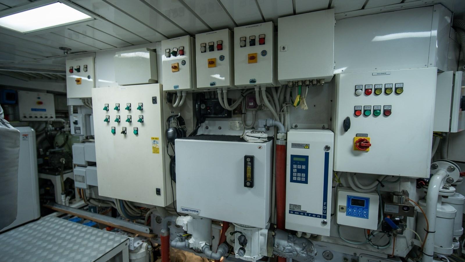 a room with several white machines aboard ORINOKIA Yacht for Sale
