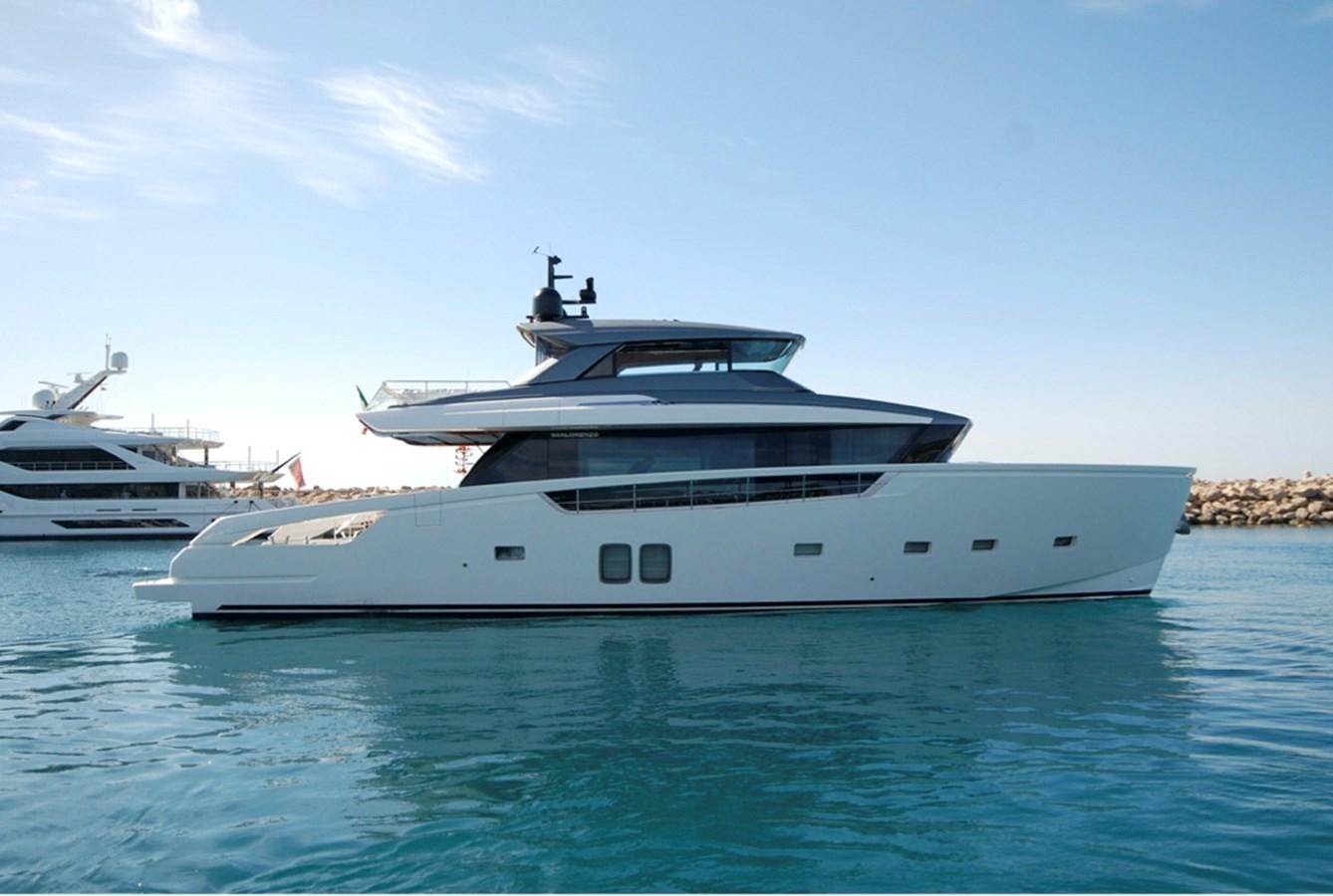 a couple of large white yachts in the water aboard SANLORENZO SX76 Yacht for Sale