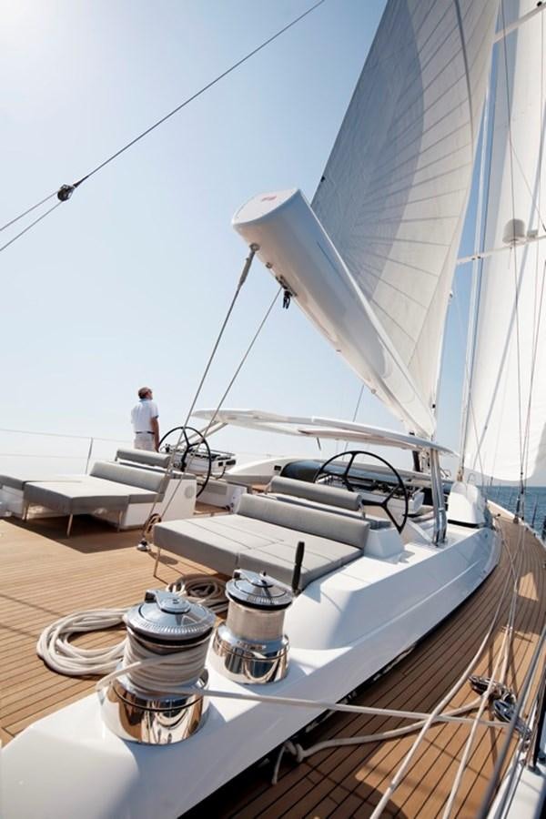 a boat with a sail on the deck aboard SERAFIM Yacht for Sale