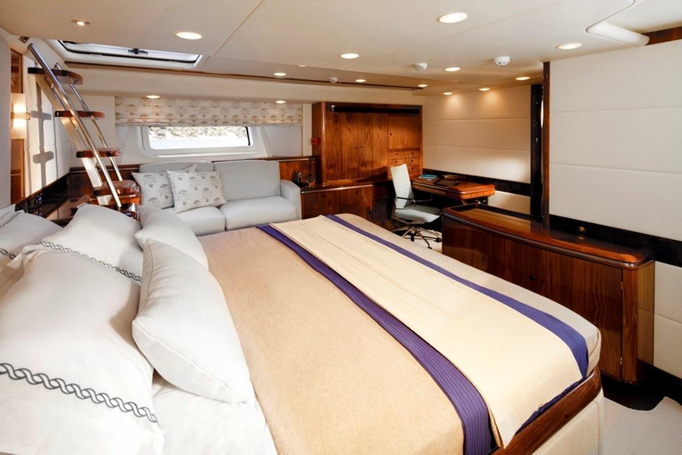 a large bedroom with a purple bed aboard SERAFIM Yacht for Sale