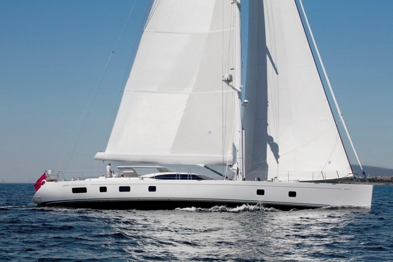 a white sailboat on the water aboard SERAFIM Yacht for Sale