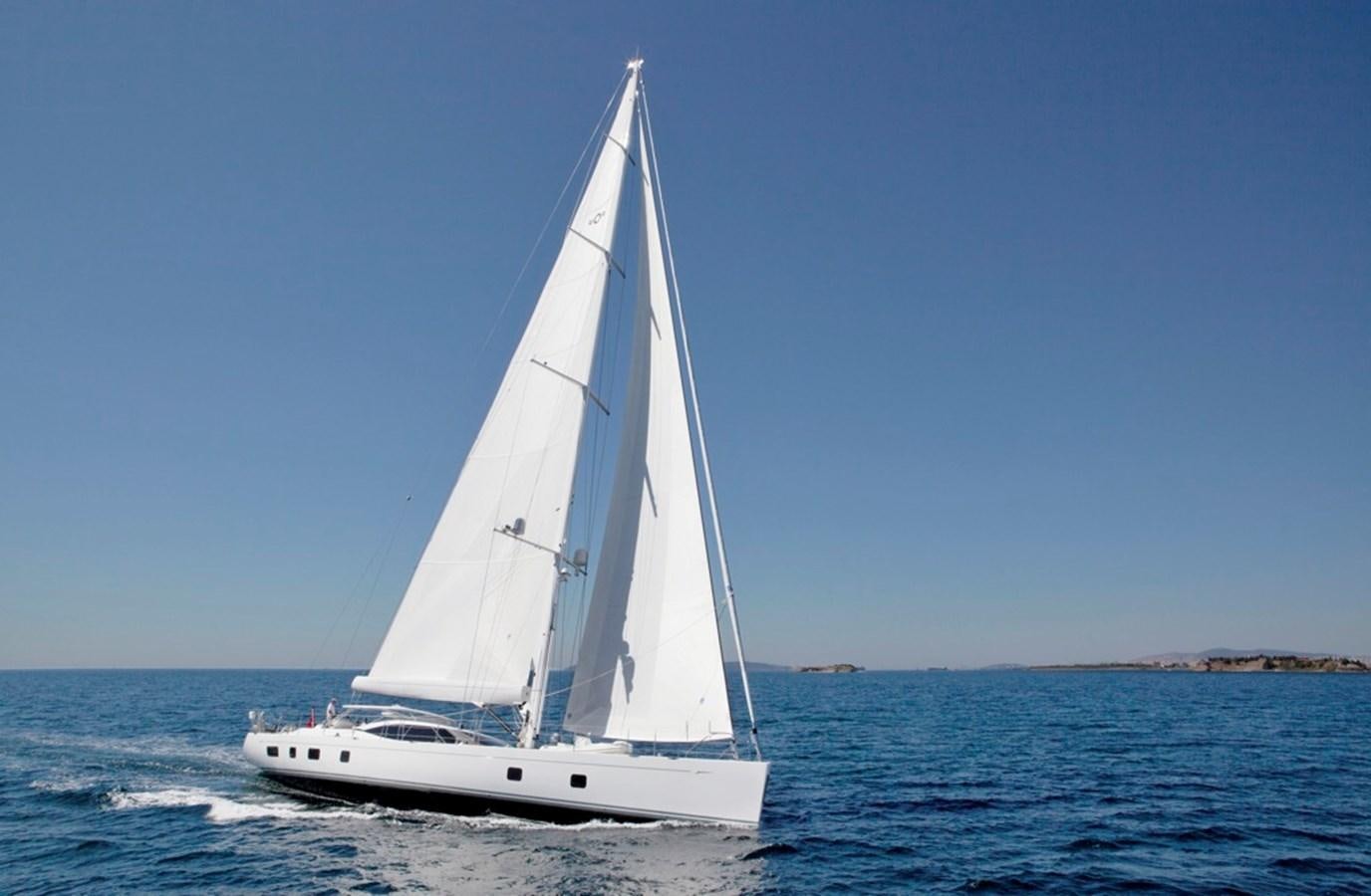 a white sailboat on the water aboard SERAFIM Yacht for Sale