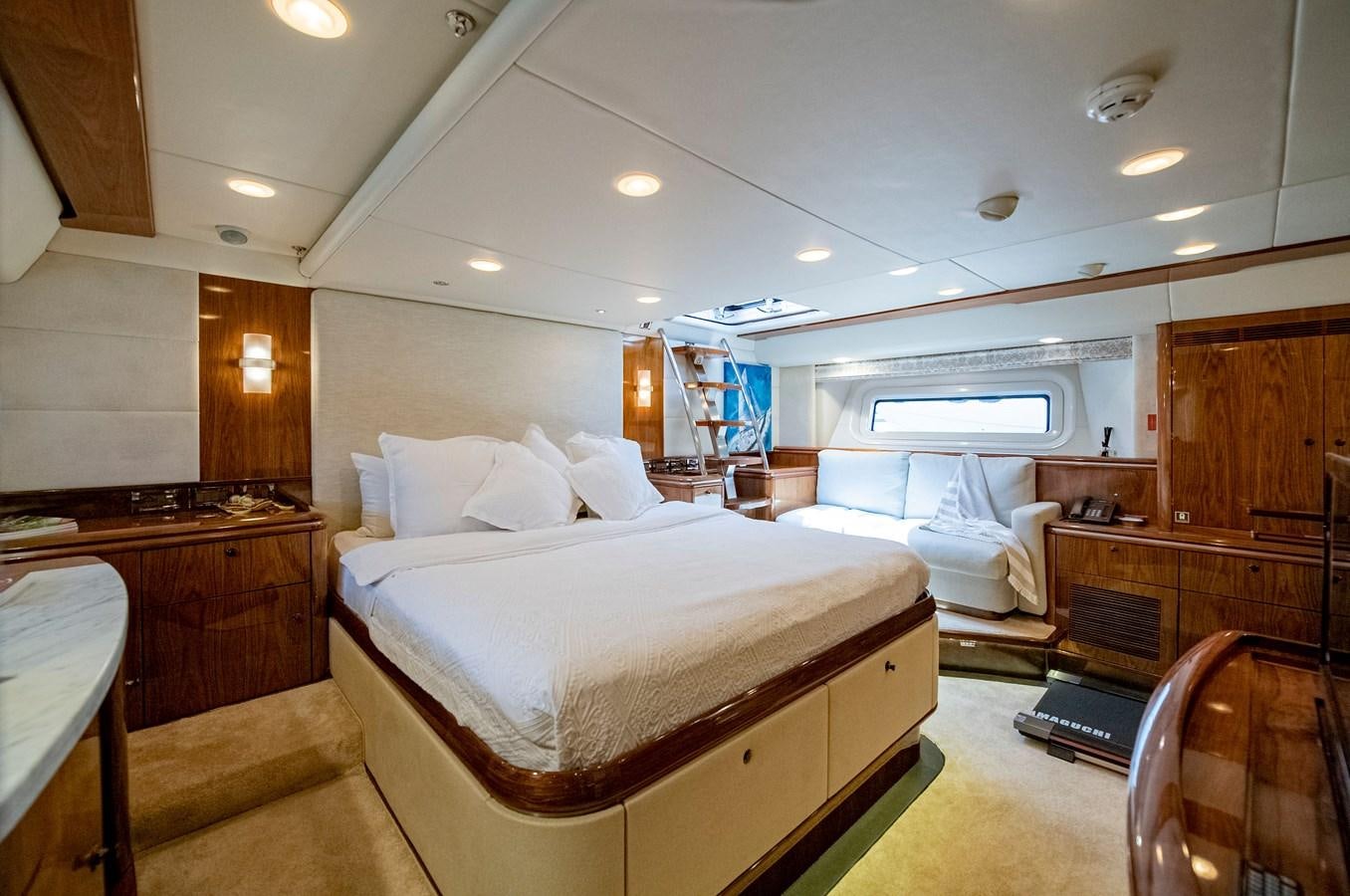 a large bedroom with a large bed aboard SERAFIM Yacht for Sale
