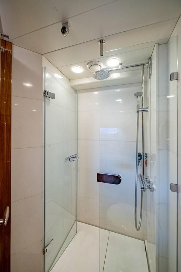 a shower with a glass door aboard SERAFIM Yacht for Sale