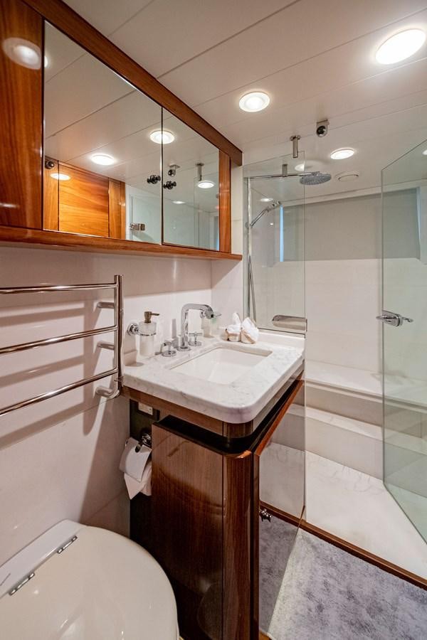 a bathroom with a sink and a toilet aboard SERAFIM Yacht for Sale