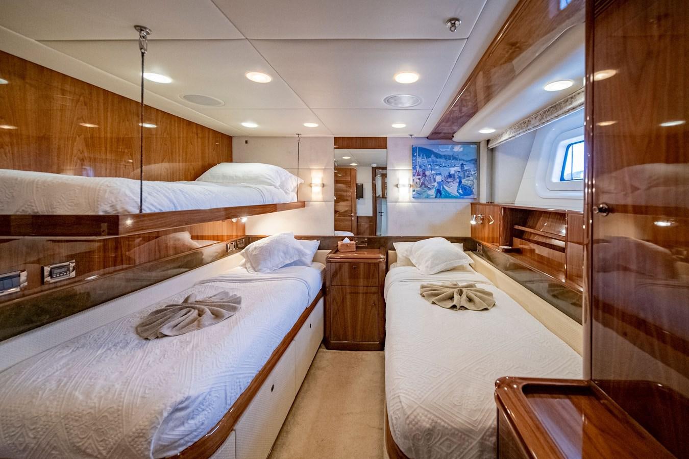 a room with bunk beds aboard SERAFIM Yacht for Sale