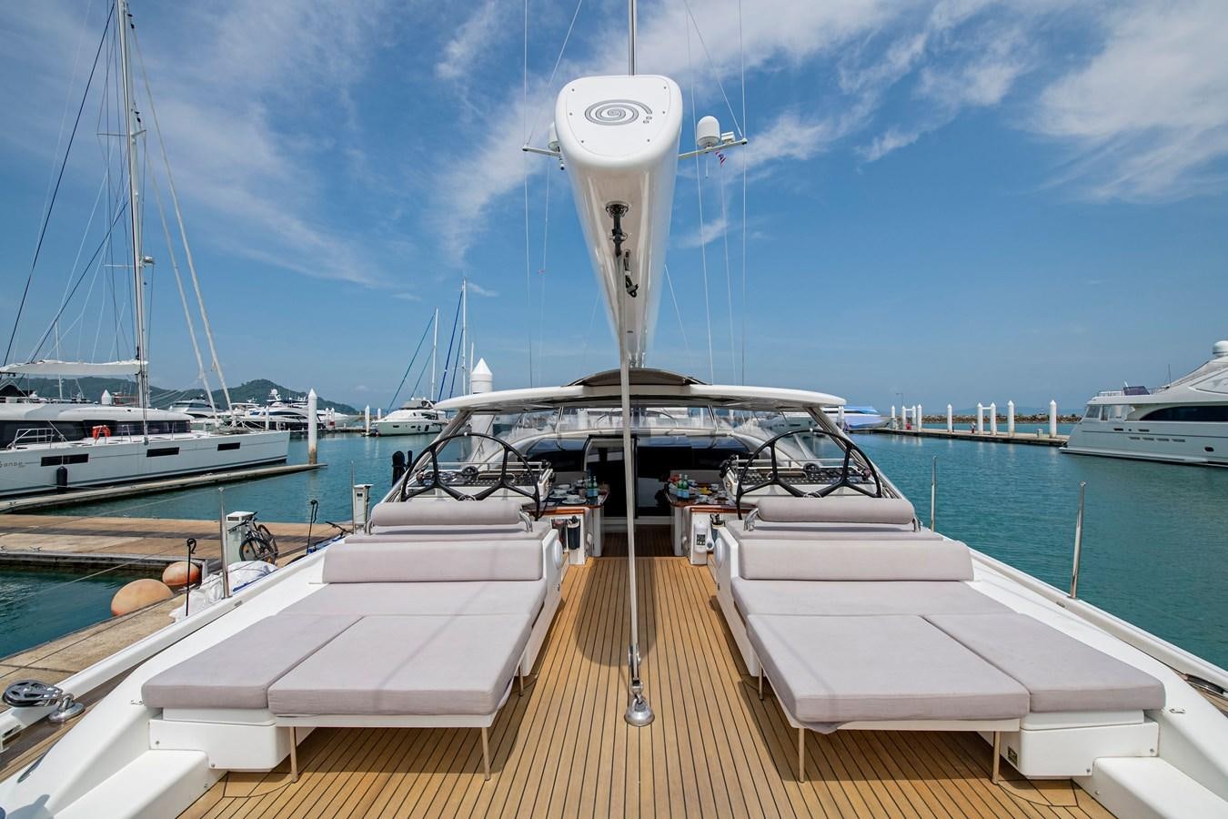 a boat dock with boats aboard SERAFIM Yacht for Sale