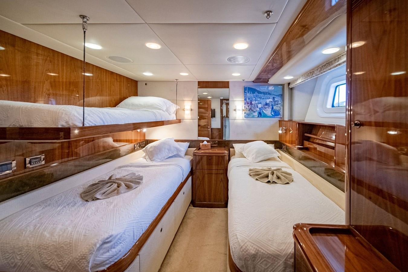 a room with bunk beds aboard SERAFIM Yacht for Sale