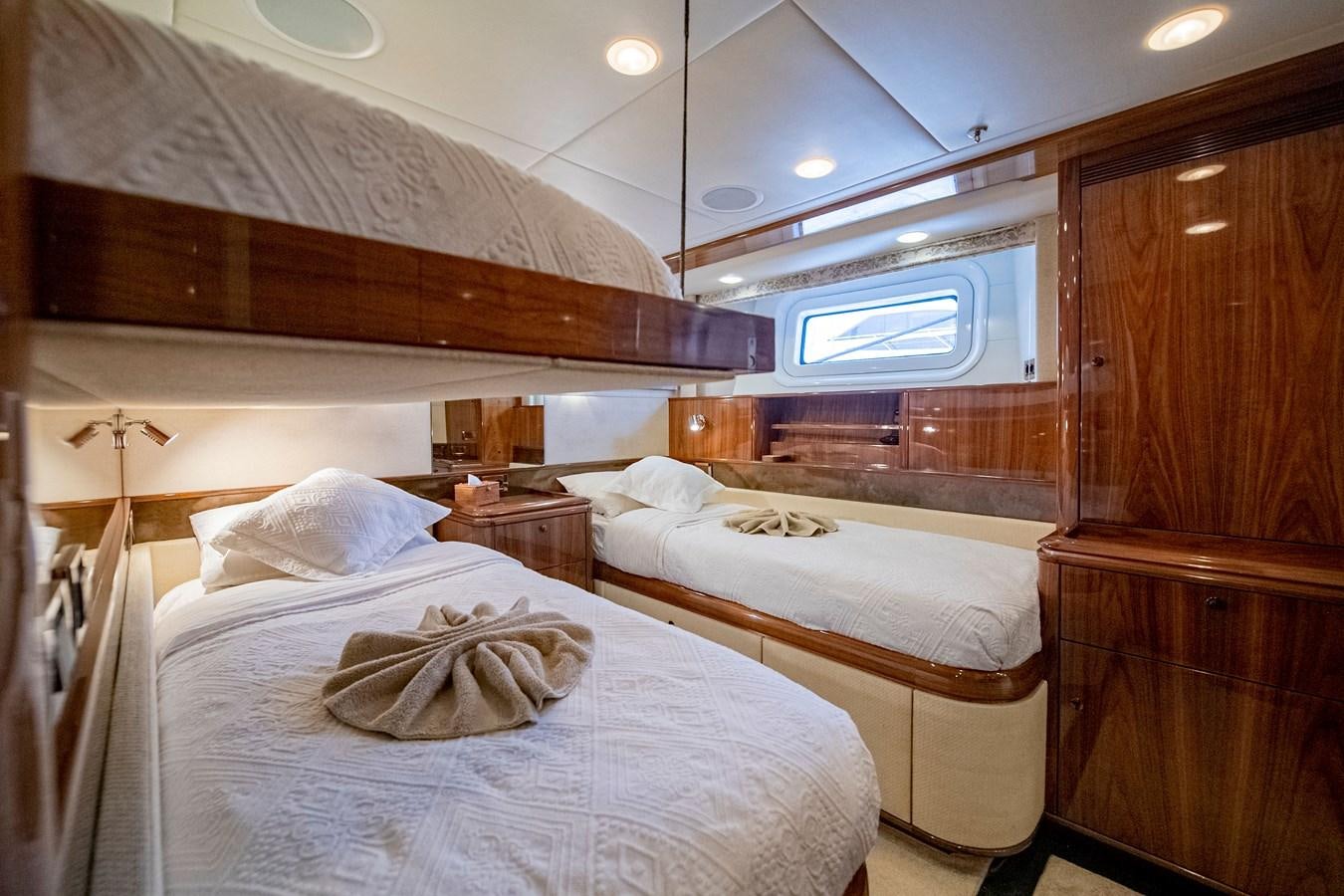a room with two beds aboard SERAFIM Yacht for Sale