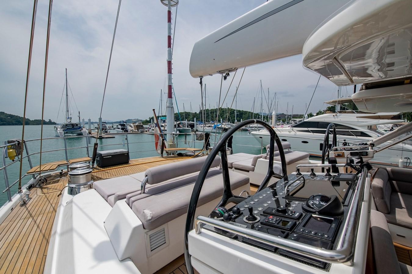 a boat with a steering wheel aboard SERAFIM Yacht for Sale